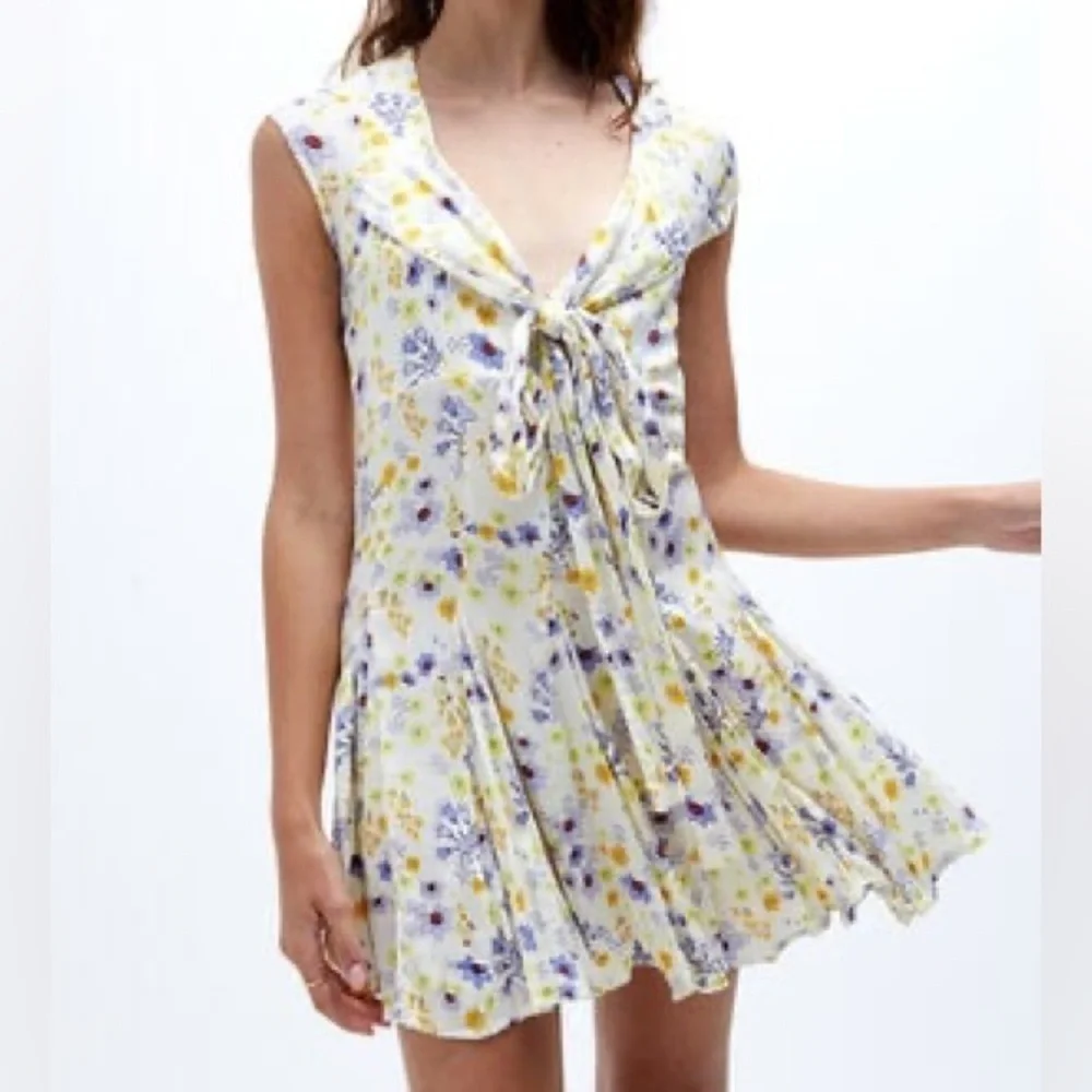 NWT FREE PEOPLE “It Takes Two” wrap mini dress in ivory combo
